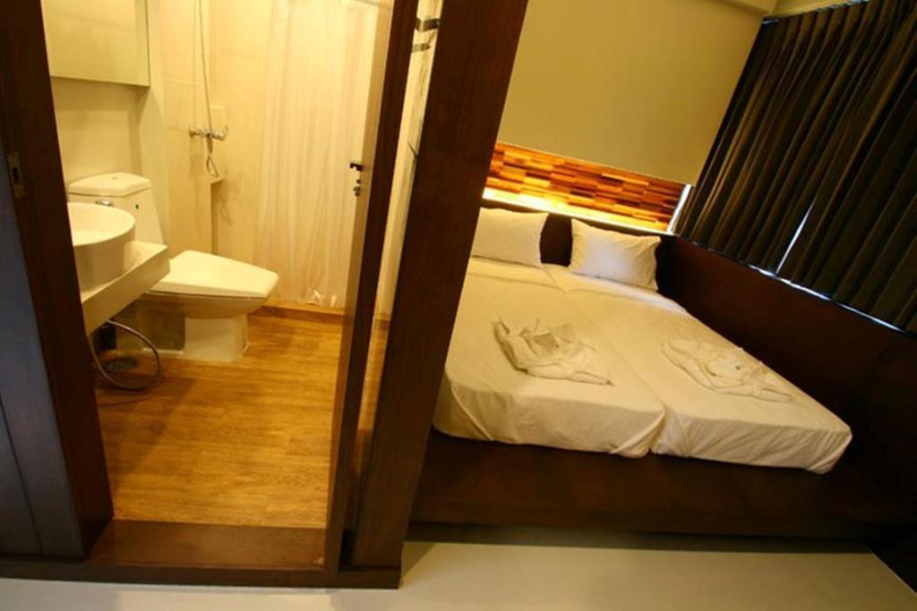 At One Inn Hualampong Bangkok Oda fotoğraf